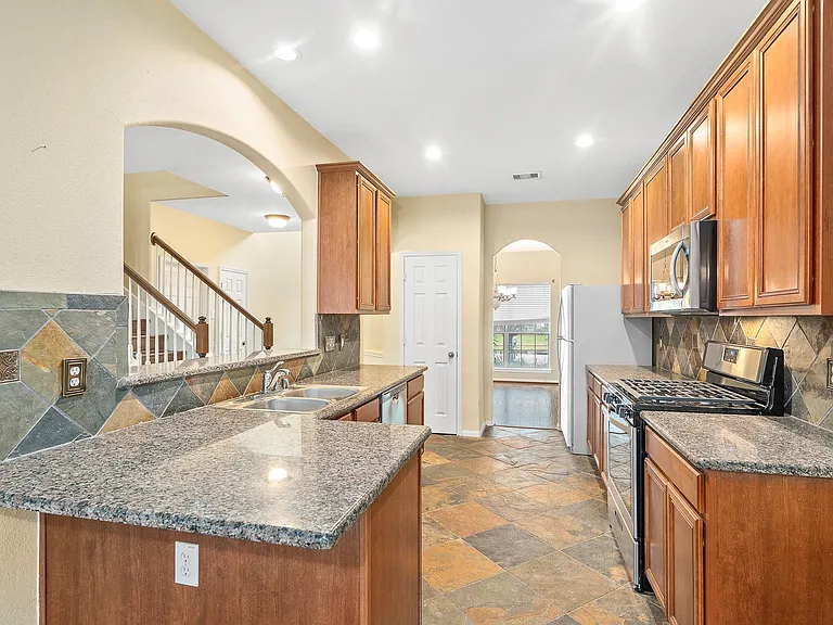 10003 Lynette Falls Dr — Photo 16