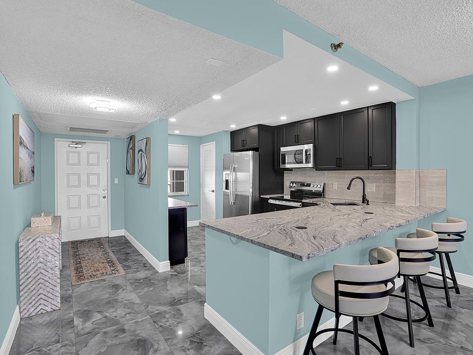 1st image of 4015 W Palm Aire Dr APT 704