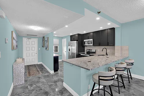 4015 W Palm Aire Dr #704 Photo 1