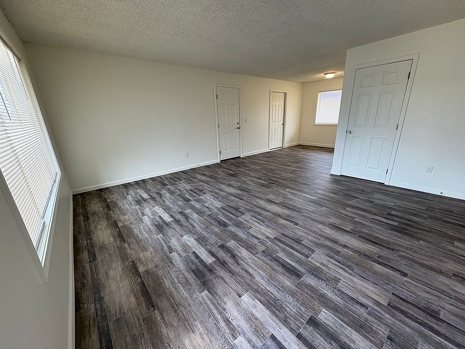 Living Room open to Dining Room, new wood grain vinyl flooring