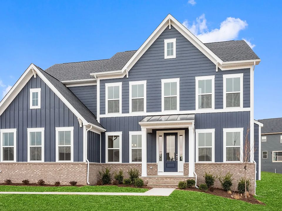 Albemarle Exterior with Blue Siding and Partial Brick at South Lake in Bowie, MD - Sideload Not Offe