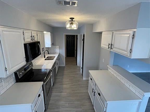 4th image of 5834 Woodmancote Dr