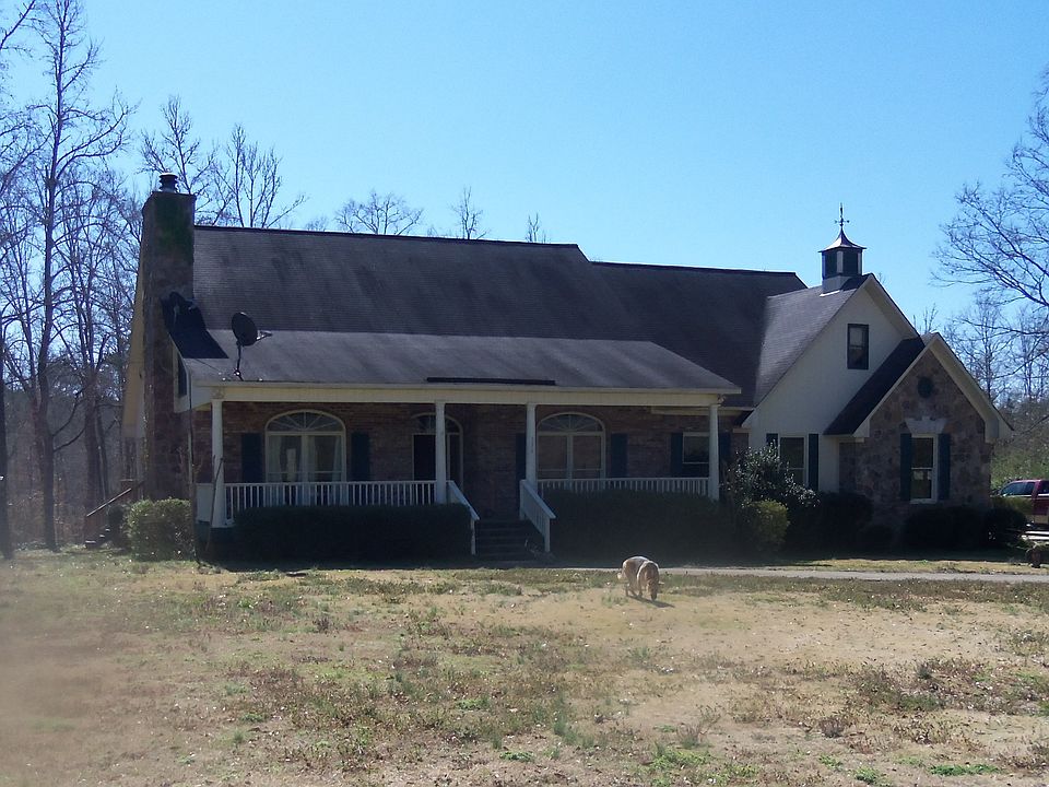 Situated on 3 acres with covered porch