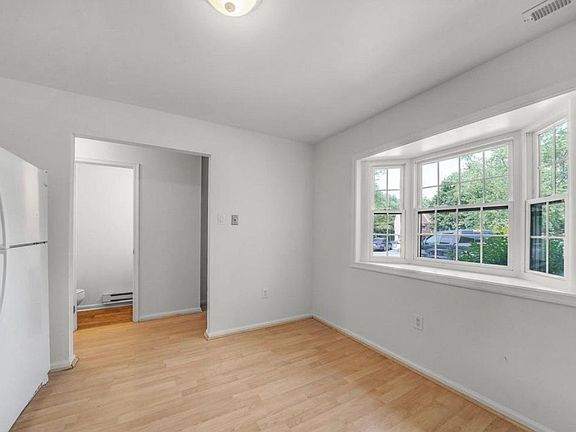 When you walk in, the left side is the kitchen and the right side is a half-bathroom.