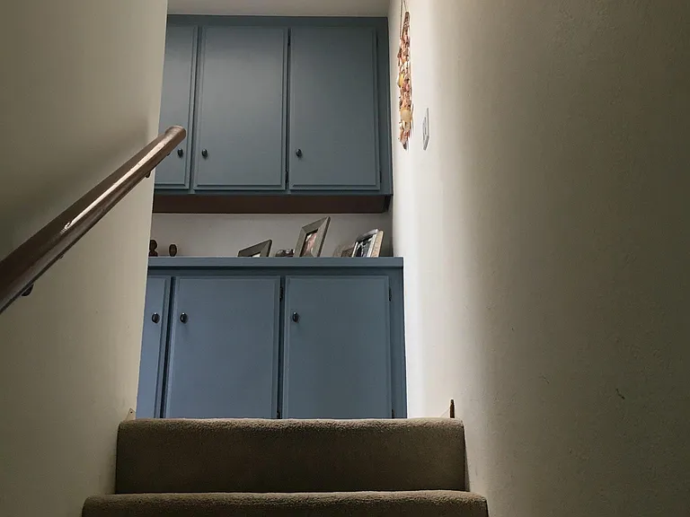 Stairs to second floor / whites closet