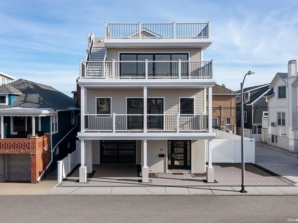 This stunning Long Beach Island home offers unobstructed views of