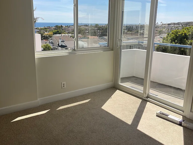 New carpet, private balcony with amazing Ocean views from second bedroom.
