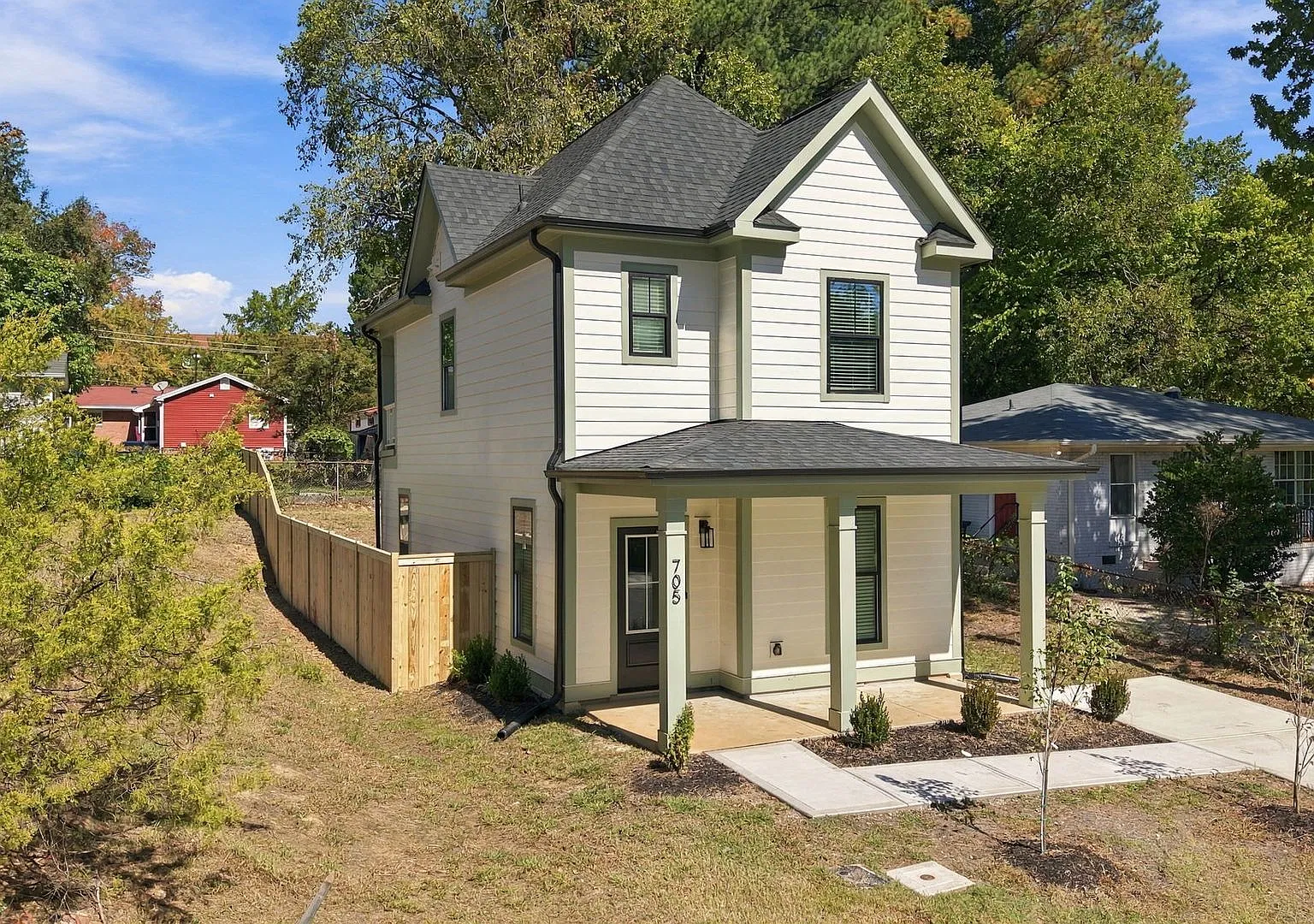 Stylish Durham Home with Modern Finishes, a Covered Balcony & Fenced Backyard! — Photo 1