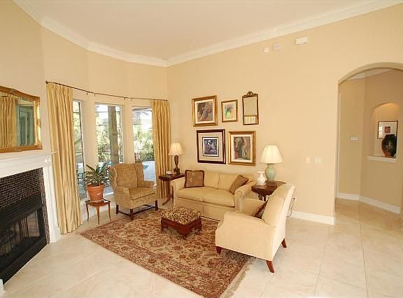 Formal living room with fireplace & bay window