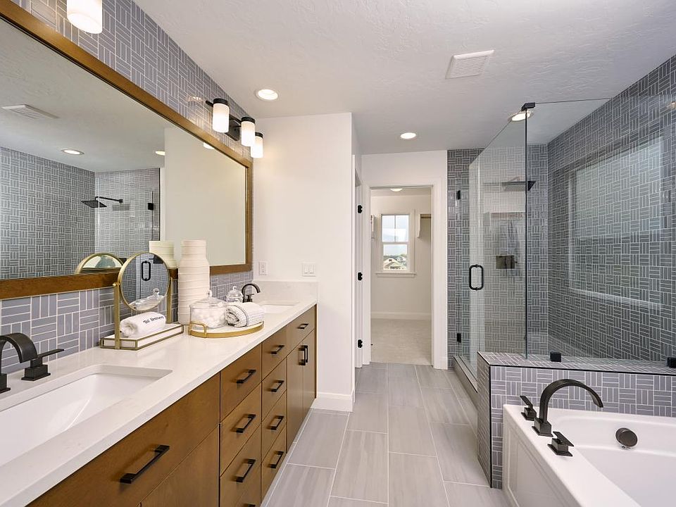 Representative Photo - Lavish primary bath with premium finishes