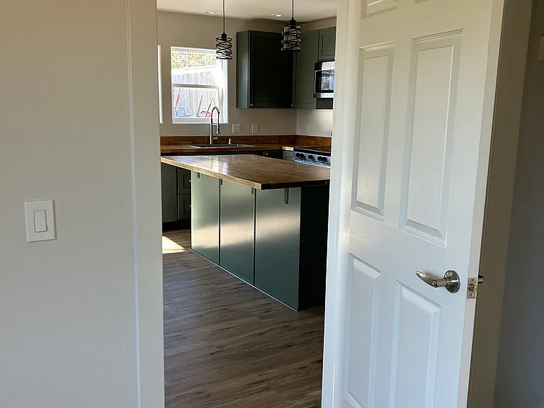 Looking into kitchen from bedroom