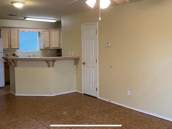 Main level-Living/dining combo, laundry & 1/2 bath