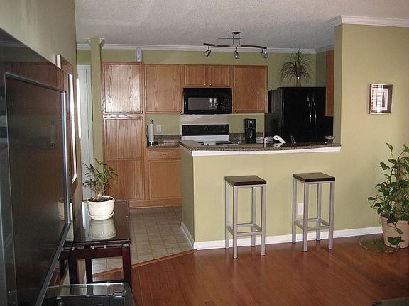 Kitchen with Sitting Bar and Decorative Lighting
