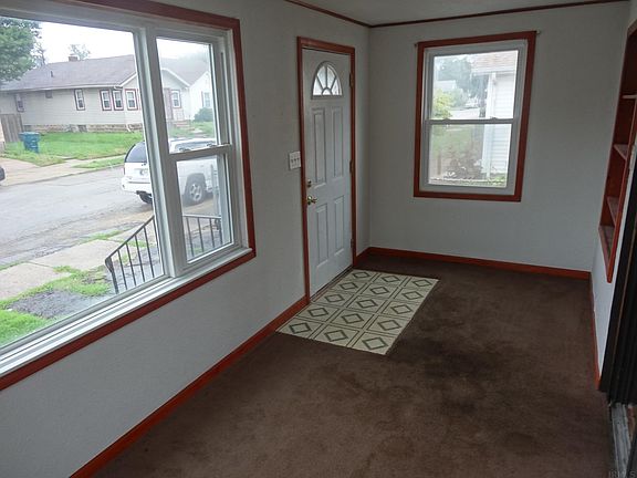 ENCLOSED FRONT PORCH