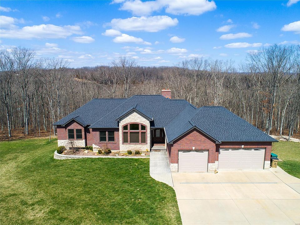 Welcome to the Beautiful Home in Festus on 5+ Acres