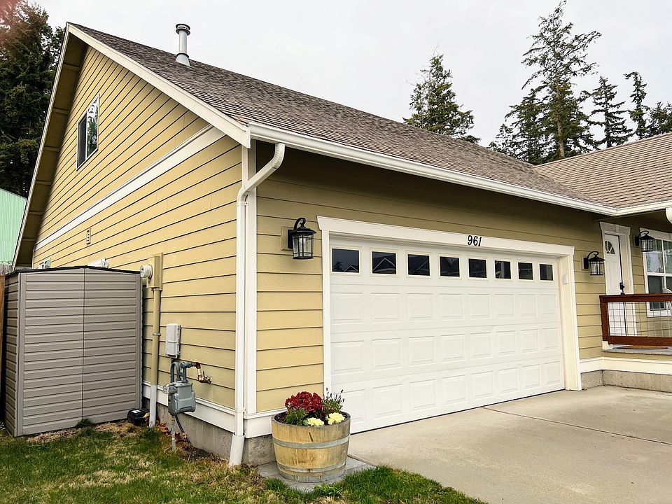 Large 2 car garage , locking shed included.