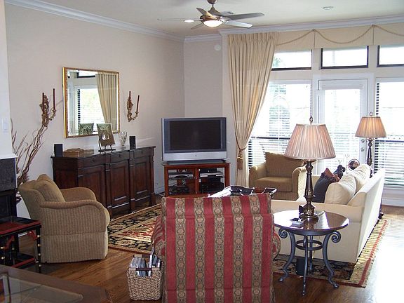 LIVING WITH FRENCH DOORS TO BALCONY