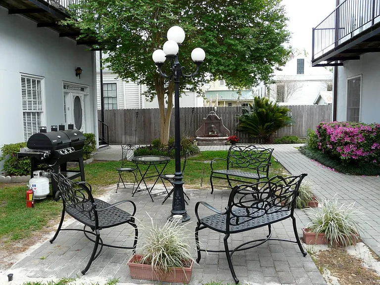 balcony off liv. overlooks courtyard with fountain & common gas grill