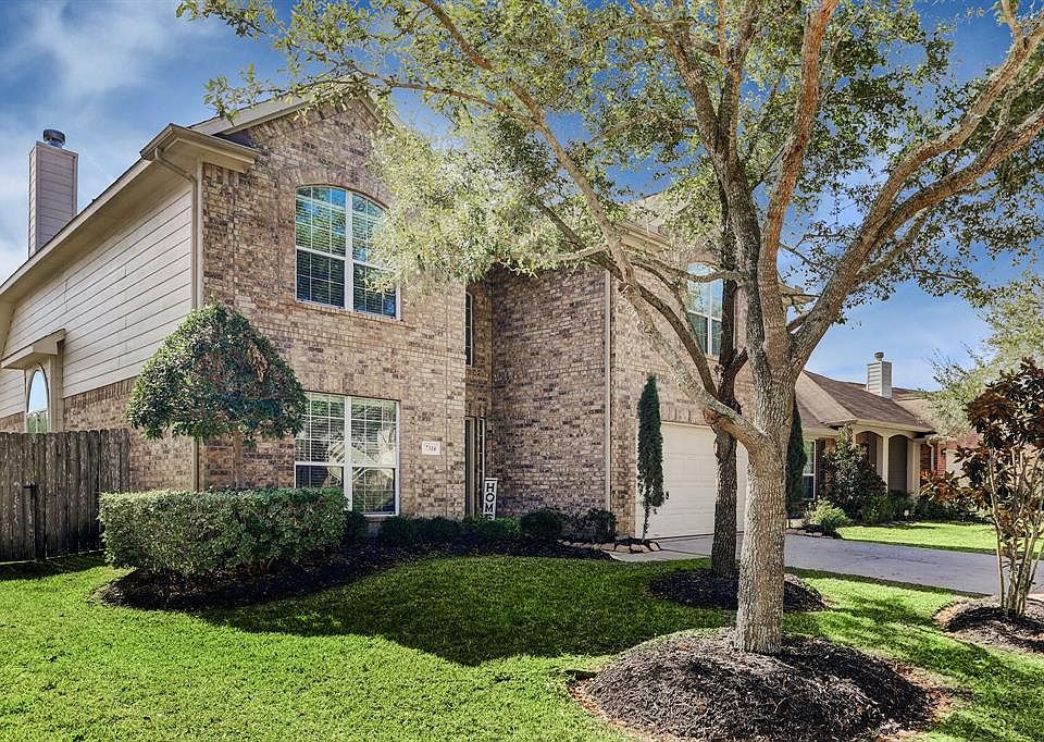 Welcome Home! Beautifully kept 4 bedroom 2 1/2 bath Meritage house. Gorgeous brick exterior with mature trees and manicured lawn.