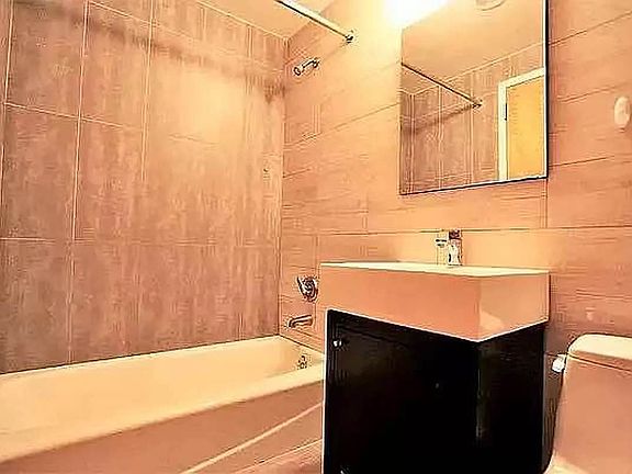 3rd image of 212 E 14th St APT 2F