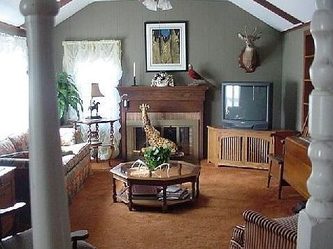 Living room + fireplace looking from stairway 
