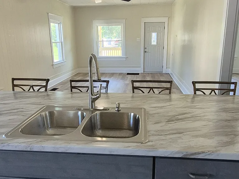 Kitchen view into Family Room. Dishwasher will be to left of sink.