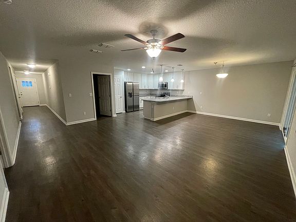 Open Living area leading to outdoors