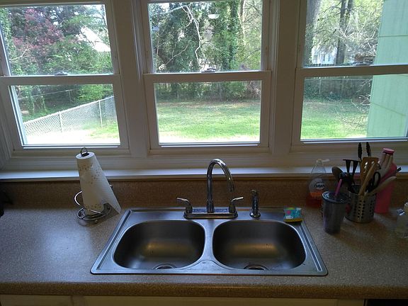 Watch your kids or dog in the back yard while washing dishes