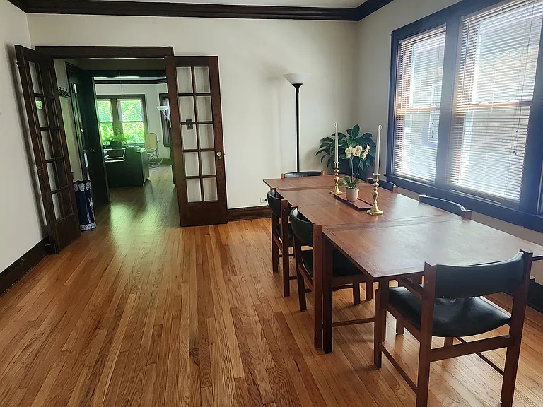 Dining Room includes a table that can be extended (seating 6-10 people), a Korean medicine chest, two plant stands, artwork and floor lamp.