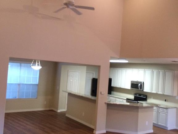 Open living area downstairs view off upstairs landing