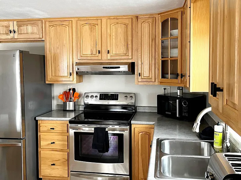Large open-concept kitchen, dining and living area.