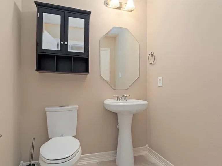 Half restroom downstairs.