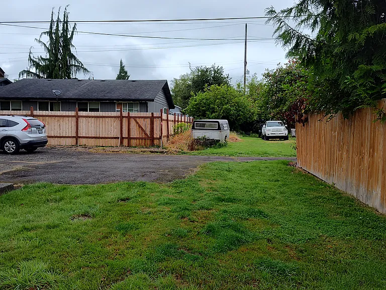 Front yard with more parking