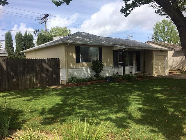 House has a small storage shed (with lock) in the back yard.