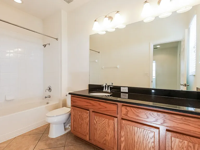 8309 Deerland Bluff Ln — Photo 15