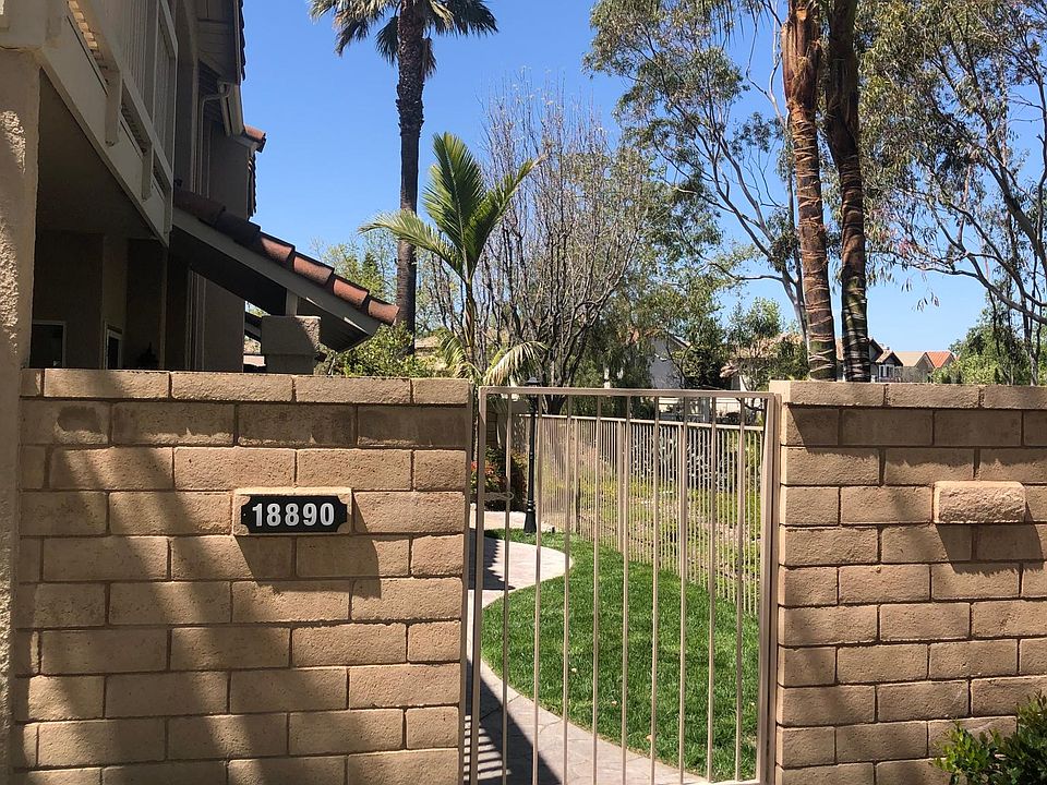 A private entrance leads to a view yard and front door.
