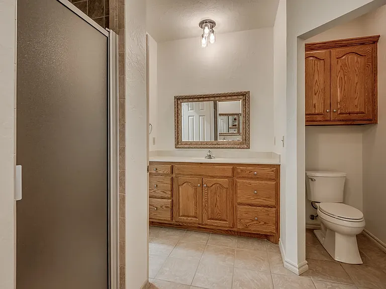 Master Bath with his / hers side of vanities (other side not shown in other photo).