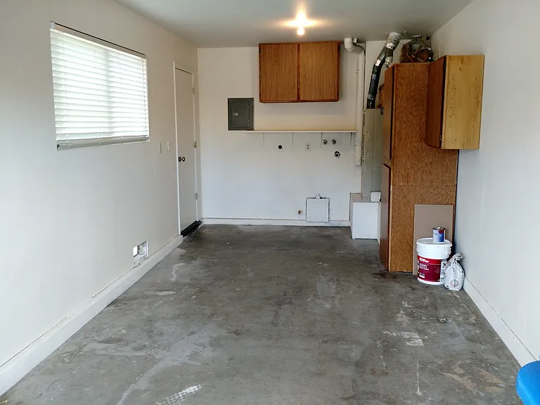 Private Single Car Garage with Laundry Washer and Dryer hookups.