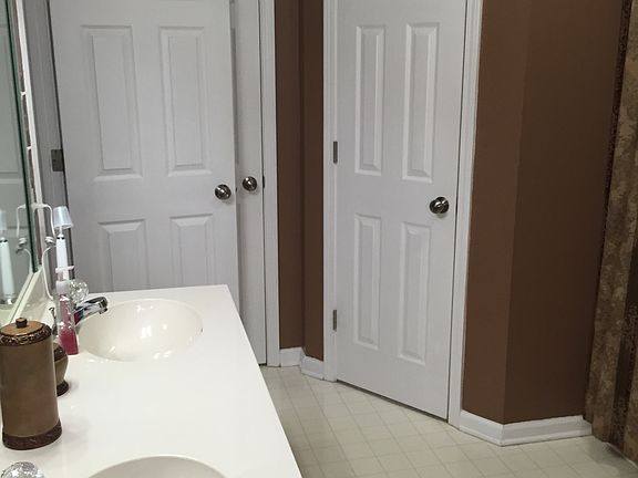 His & hers walk-in closets.