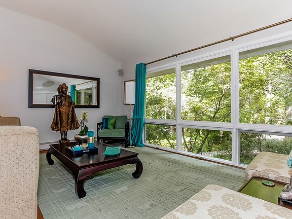 Living room with a wall of windows