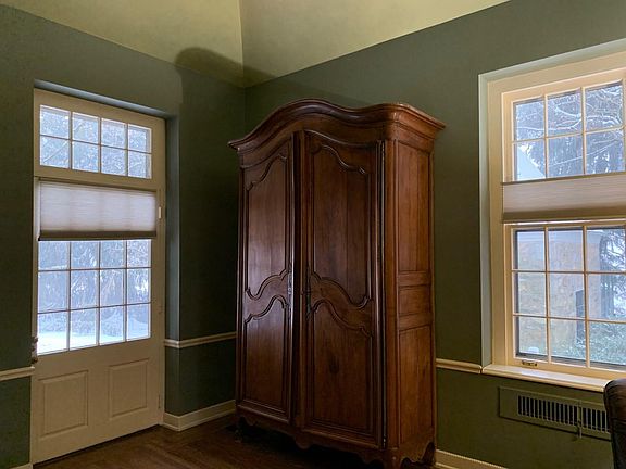 Antique armoire right by the entrance