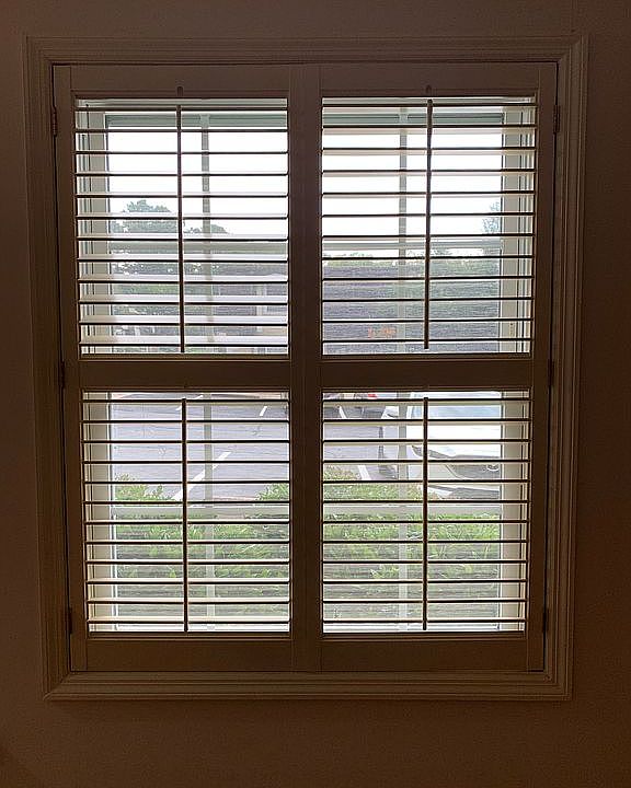 Custom wood shutters thruout