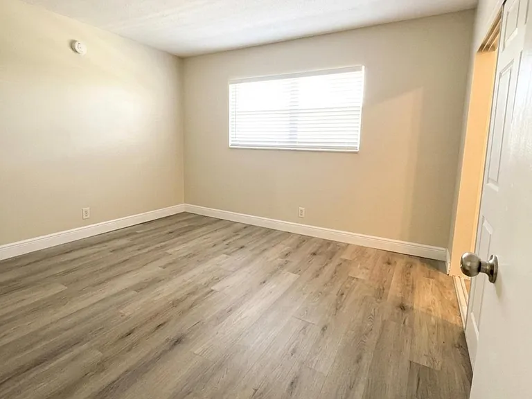 5861 NW 16th Pl #303 — Photo 10