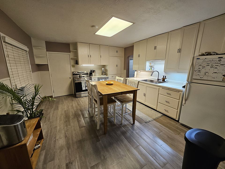 Spacious kitchen includes dishwasher, under-cabinet lighting, tons of cupboards