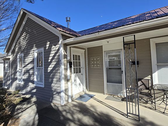 Front porch with table and two chairs