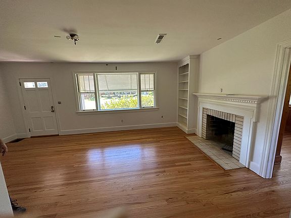 Family room/entry way. All hardwoods were refinished this summer.