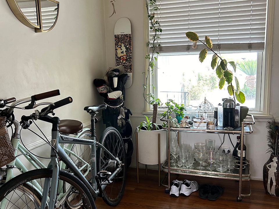 This room can be used as a dining area, office space or for bikes etc. as in photo.