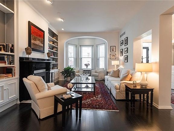 Gleaming hardwood floors throughout.