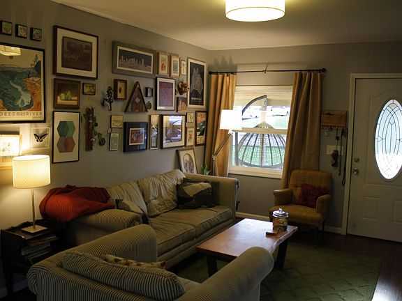 Living room with large front facing window and plenty of room for entertaining!