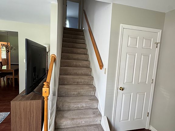 Upstairs leads to 3 bedroom, 2 full bathrooms, large extra closet and laundry area
